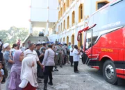 Polres Merangin Kawal Kepulangan Jemaah Haji, 101 Jemaah Disambut Haru di Kantor Bupati